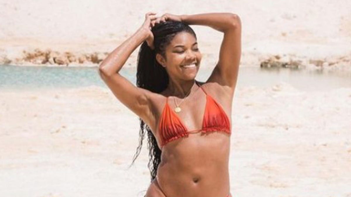 A photo of Gabrielle Union in a red bikini