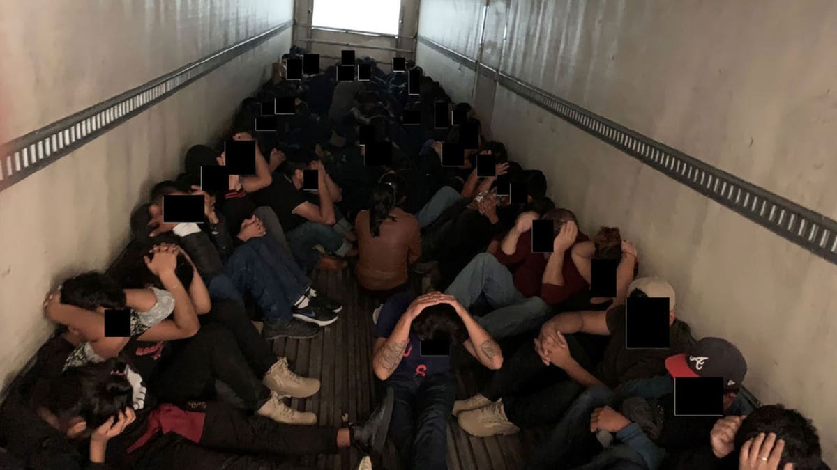 81 migrants in the back of a tractor trailer.