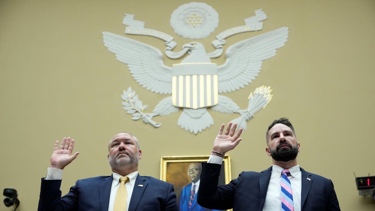 Supervisory IRS Special Agent Gary Shapley, left, and IRS Criminal Investigator Joseph Ziegler are sworn-in as they testify during a House Oversight Committee hearing related to the Justice Department's investigation of Hunter Biden.