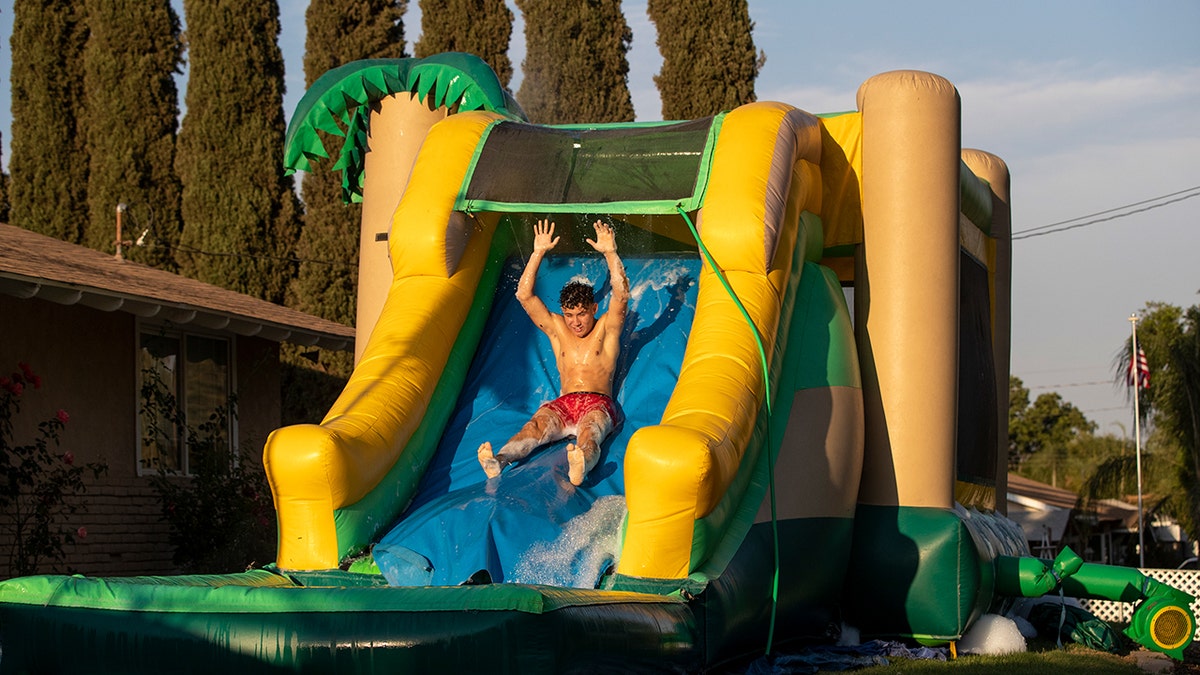 Inflatable slip 'n slide
