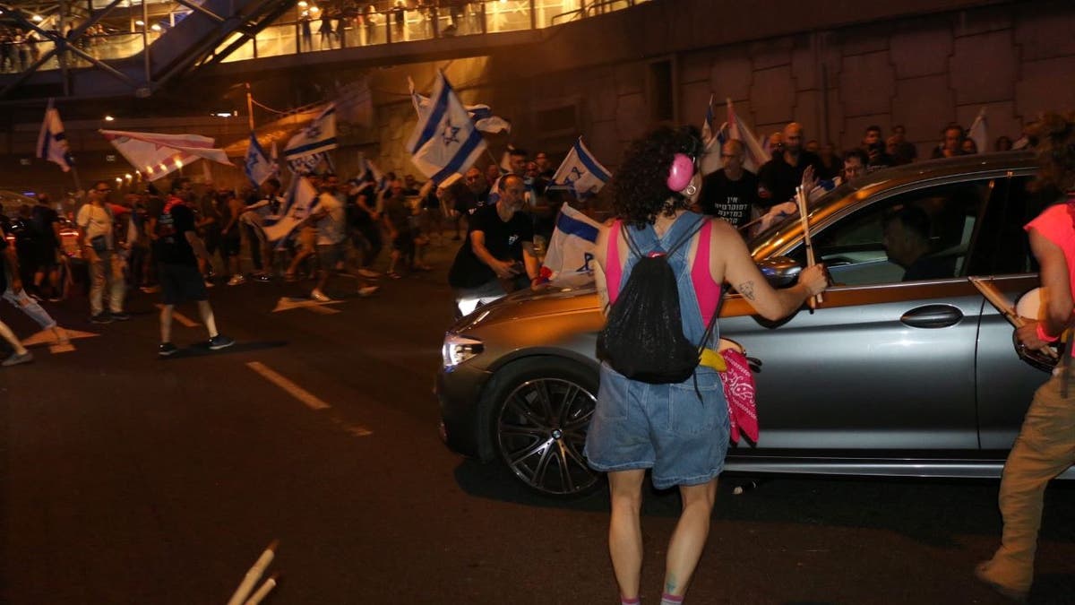 Car in Israeli protest