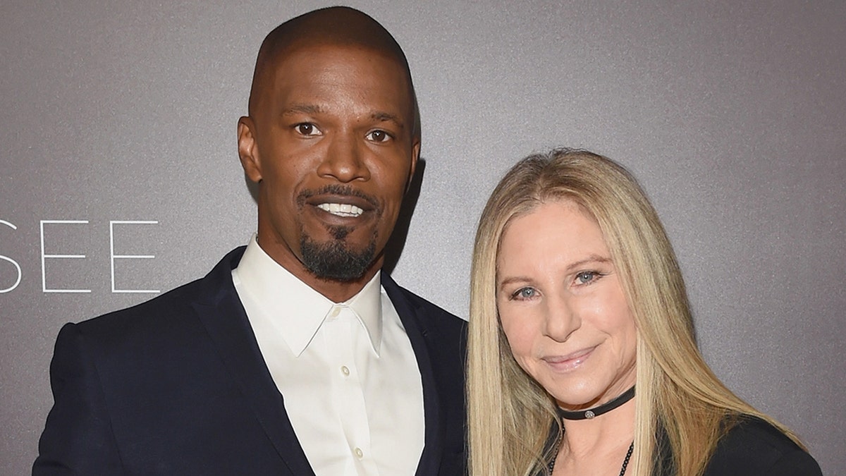 Jamie Foxx and Barbra Streisand walk red carpet for Netflix event