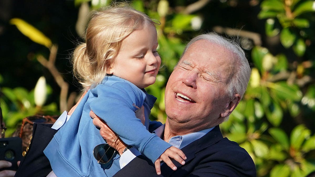 Joe Biden lifts and hugs grandson Beau Biden