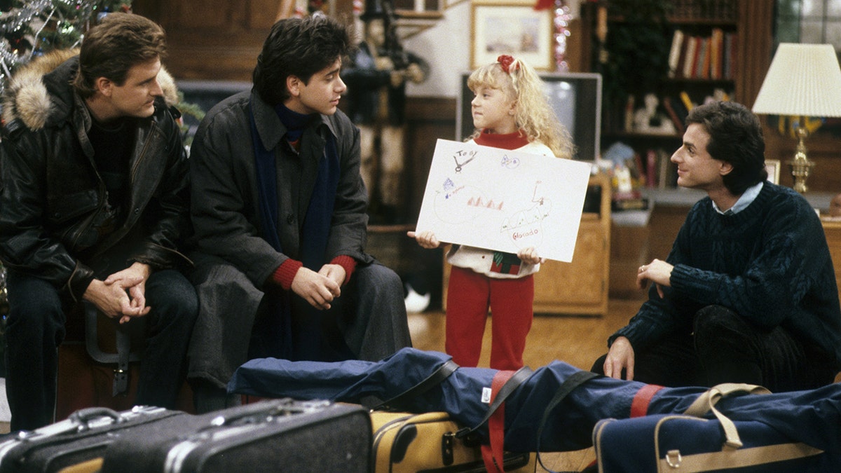 Dave Coulier, John Stamos, Jodie Sweetin and Bob Saget filming a scene for Full House