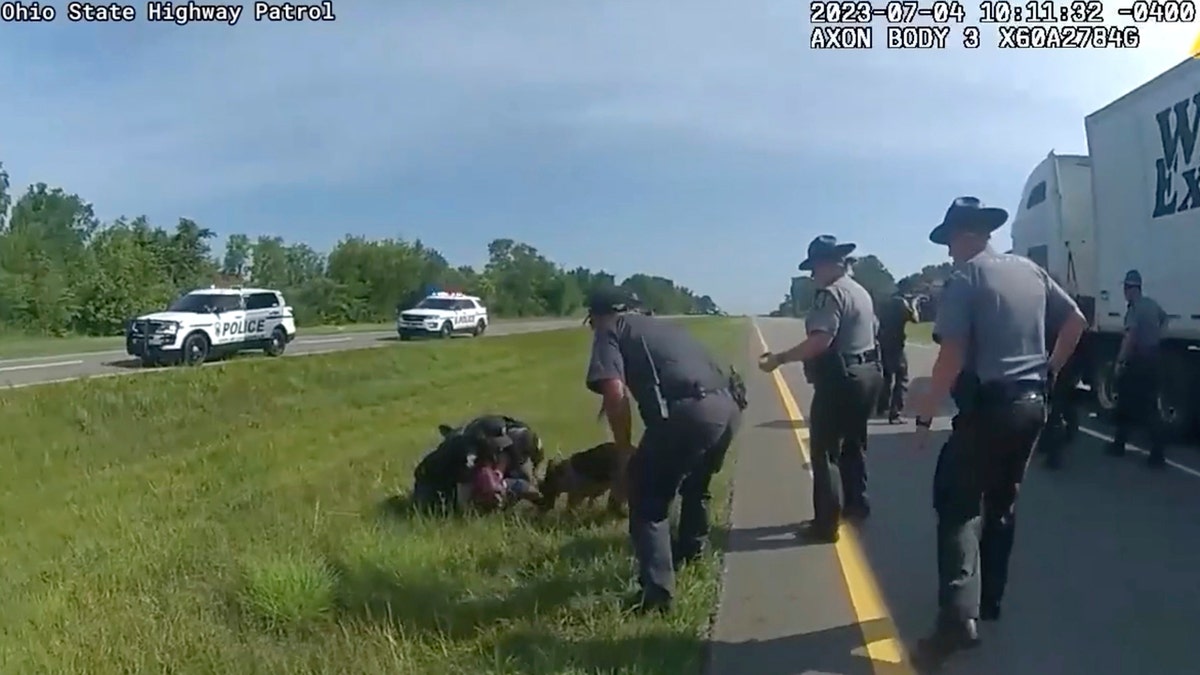 K9 attacking Jadarrius Rose