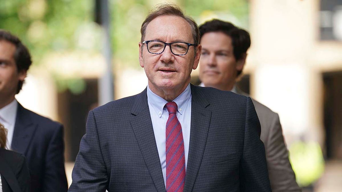 Kevin Spacey walking into court