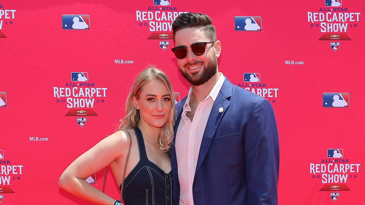 Lucas Giolito poses with his wife at the MLB Red Carpet Show in 2019