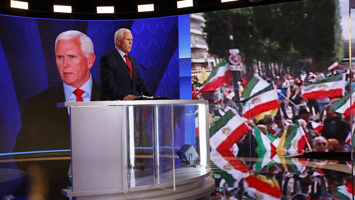 Former Vice President Mike Pence delivers a speech in Paris, France