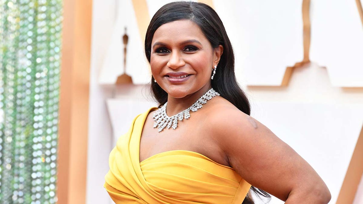 Mindy Kaling in a yellow gown