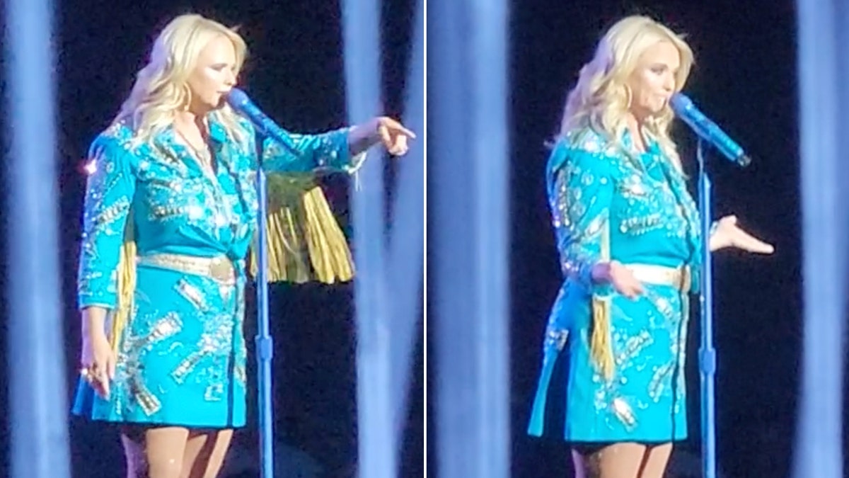 Miranda Lambert em um vestido azul com franja aponta para a multidão dividida Miranda Lambert abre os braços dos dois lados com as palmas para cima