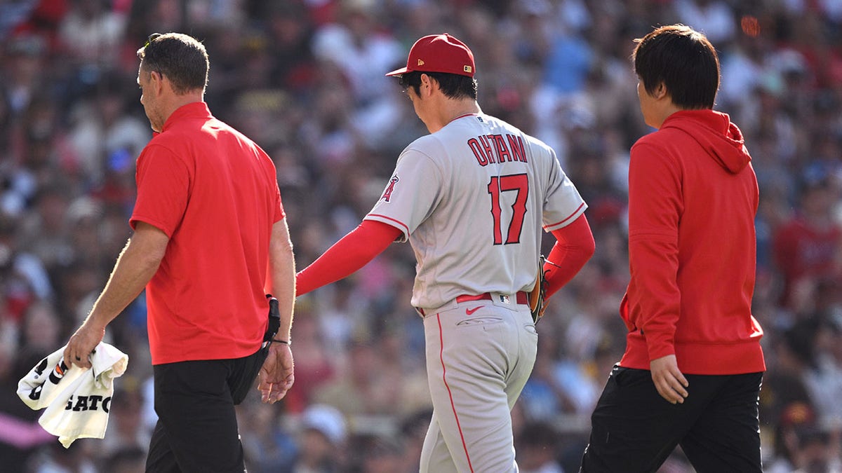 Ohtani leaves with trainer