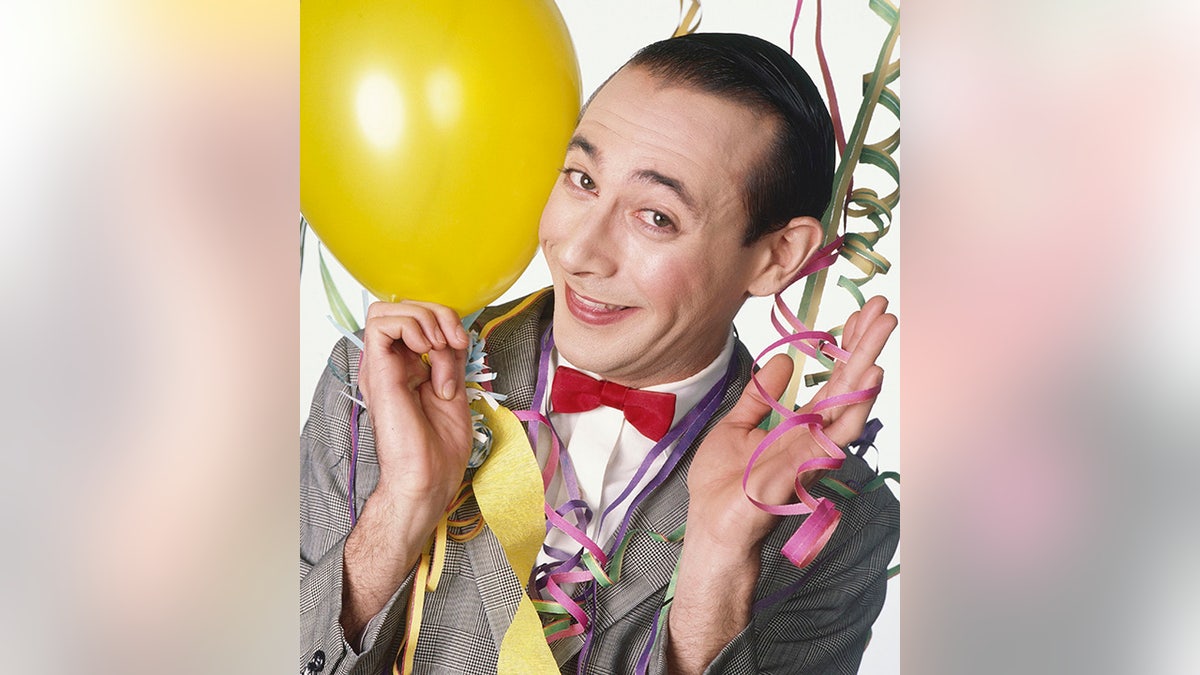 Actor Paul Reubens, known for playing Pee-wee Herman, is seen in a 1995 portrait