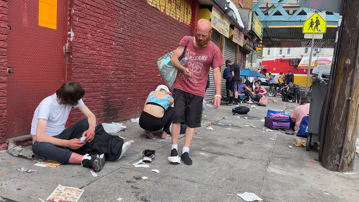 Drug users outside convenience store in Philadelphia