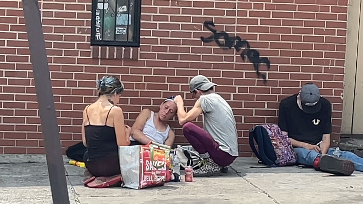 Heroin addicts inject on the streets of Philadelphia