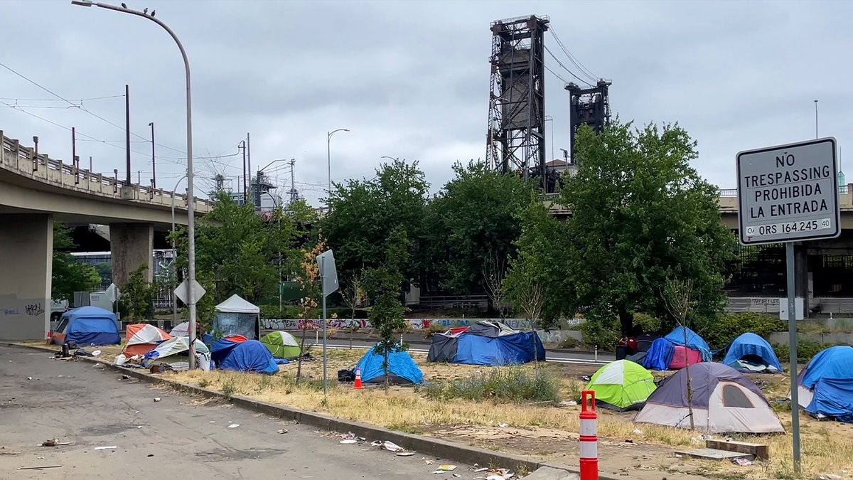 homeless tents in front of Portland bridge