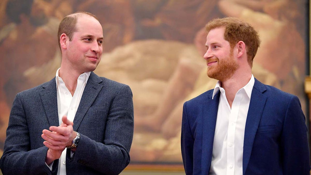 Princes William and Harry looking at each other