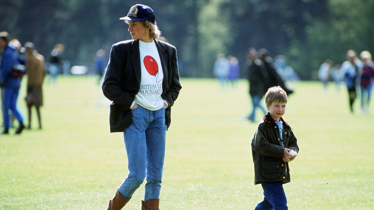Princess Diana wearing a blazer, baseball cap and boots