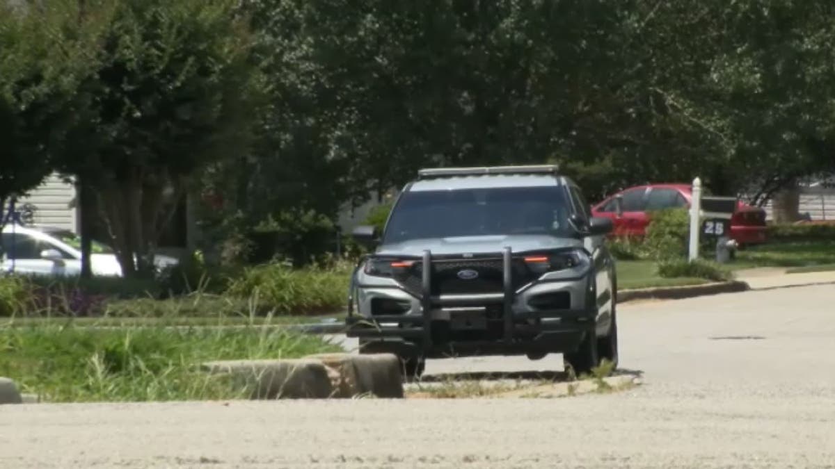 Hampton PD car at shooting scene