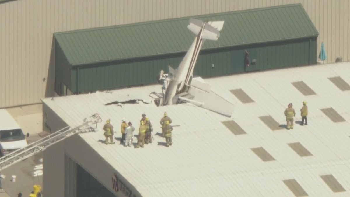 Long Beach Airport plane stuck in building