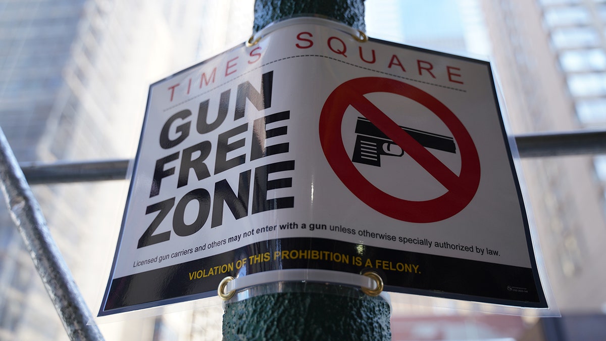 Signs proclaim Times Square is a gun free zone