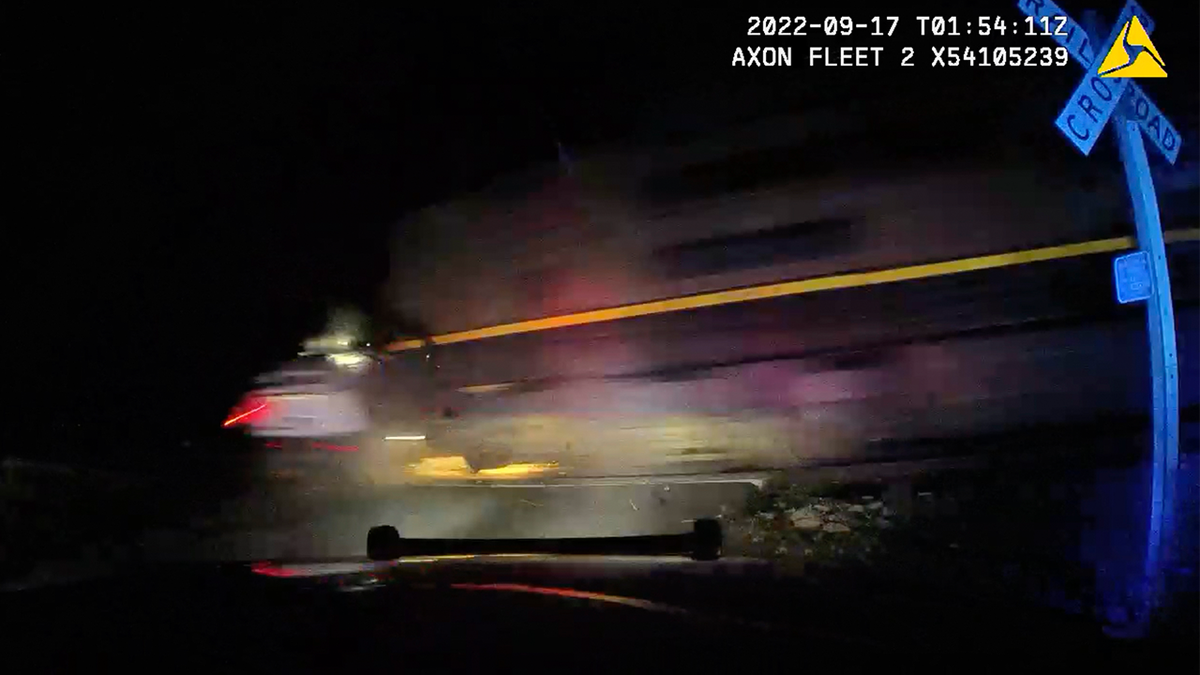 Train crashes into patrol car