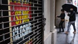 A store stands closed near Wall Street as the coronavirus kept financial markets and businesses mostly closed on May 8, 2020 in New York City.