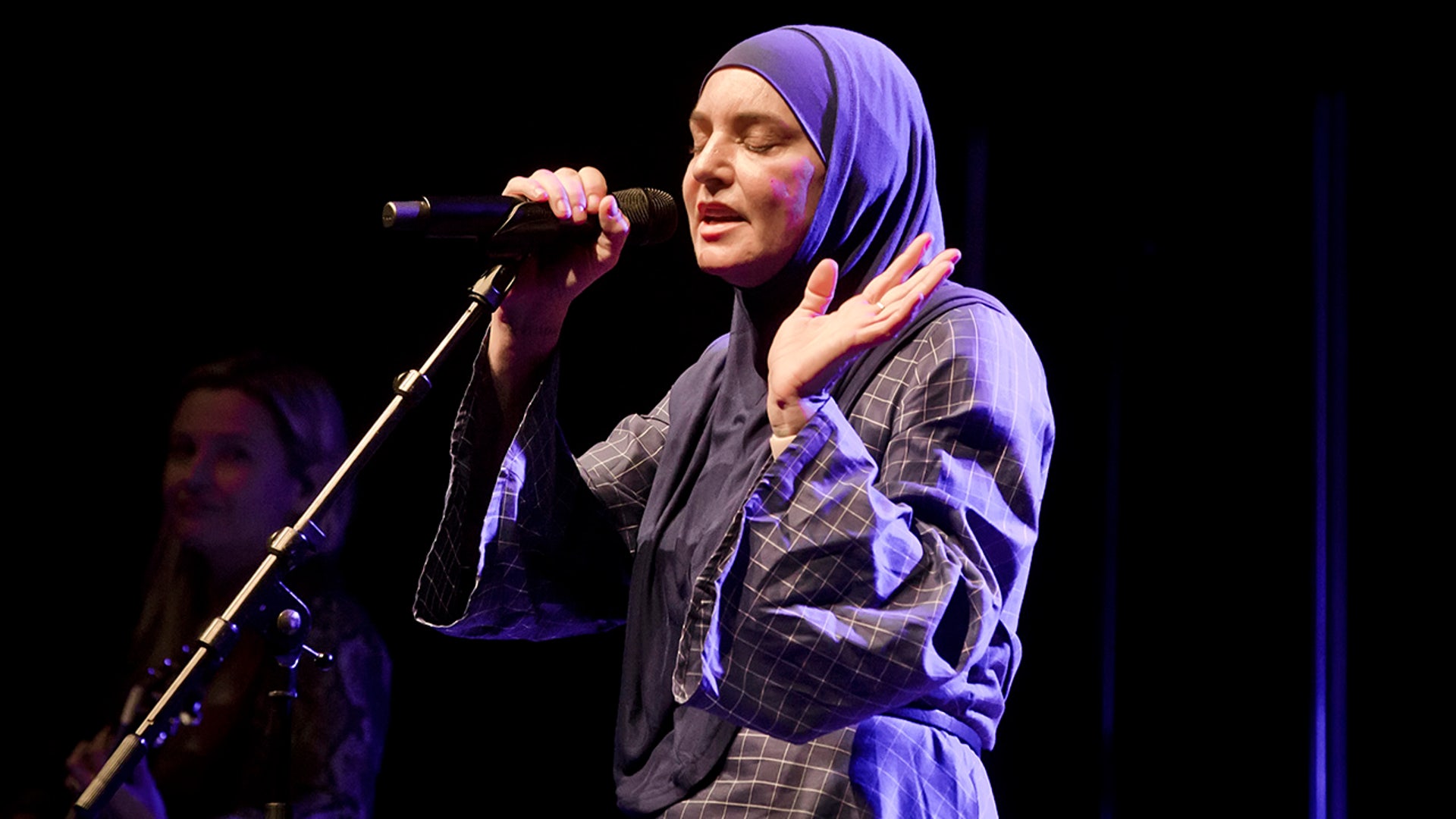 Sinead O'Connor on stage performing in Berlin