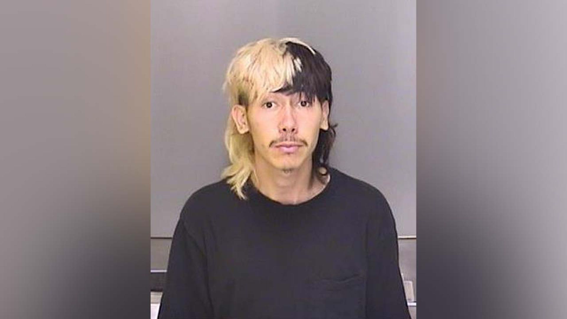 A mugshot of Michael Reyes