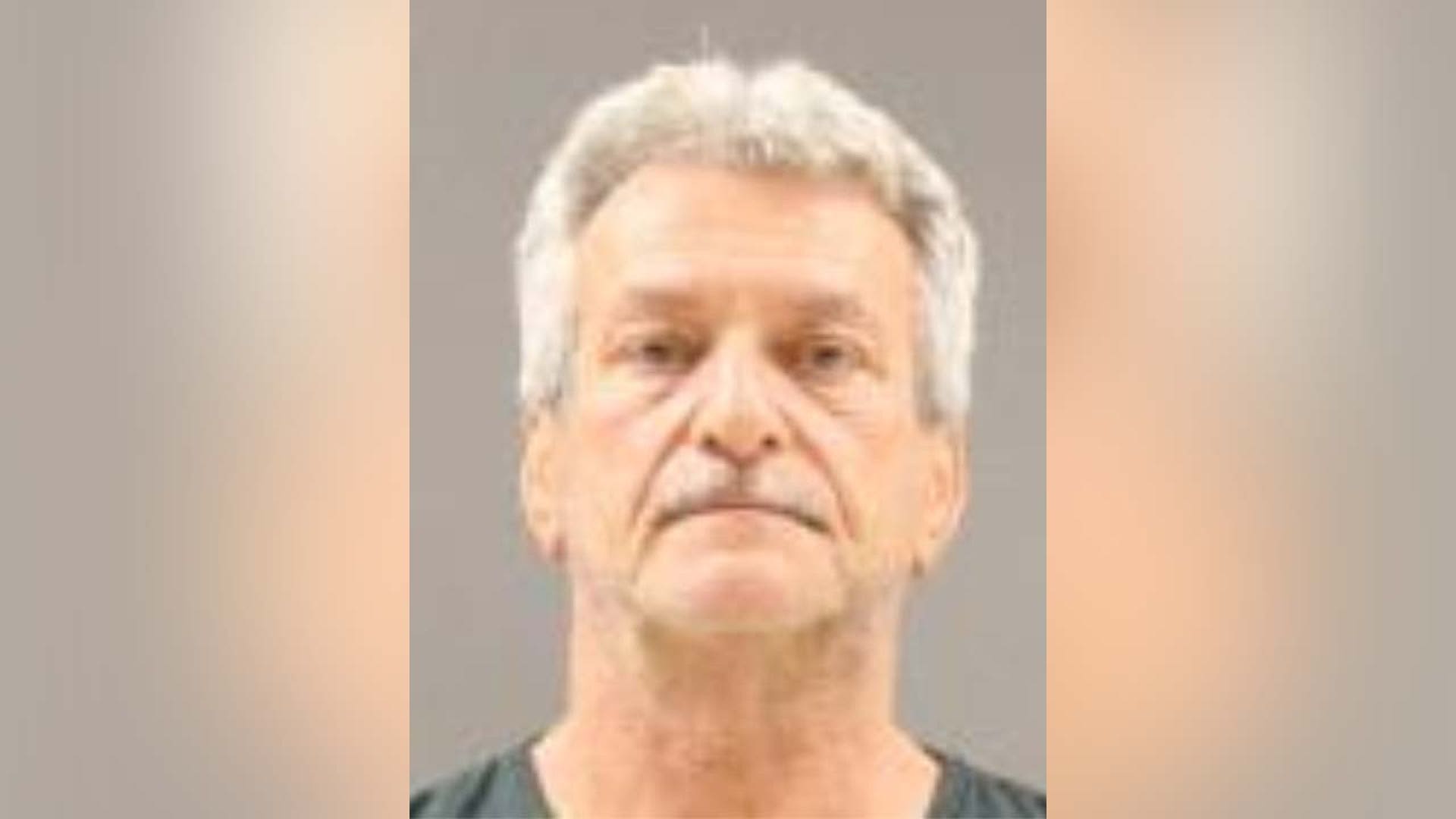 A mugshot of Harry Conaway