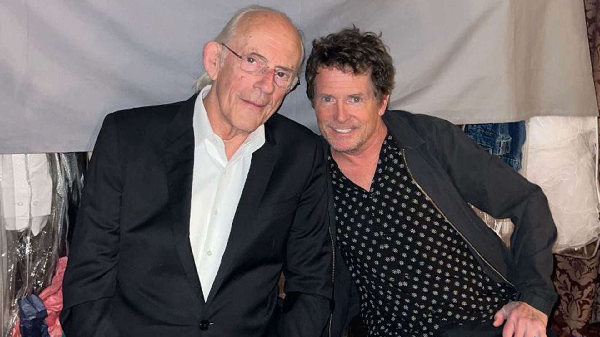 Michael J. Fox and Christopher Lloyd posing for a photo together