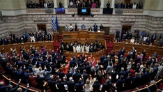 New Greek lawmakers sworn in following election victory for conservative party