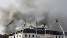 Man facing terrorism charges for burning South Africa's Parliament building says he 'burned it intentionally'