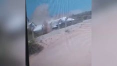 WATCH: Plane skids off runway upon arrival, smashes to pieces on protective barrier