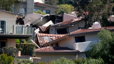 Landslide ravages homes in southern California community, evacuations continue