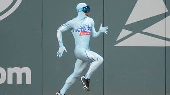 Braves fan stumbles near finish line, falls inches short of beating 'The Freeze' in foot race