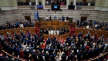 New Greek lawmakers sworn in following election victory for conservative party