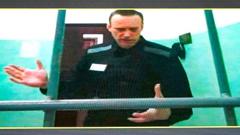 Russian prosecutors push for 20 year sentence for imprisoned opposition leader Alexei Navalny