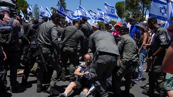 Israel parliament passes Netanyahu's judicial reform bill amid mass protests