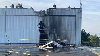 Single-engine plane crashes into California hangar, killing pilot, 2 others