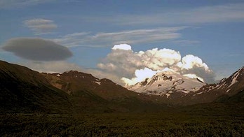 Alaska volcano eruption eases after emitting massive ash cloud