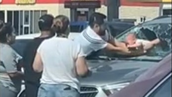 Texas dad smashes windshield to rescue crying baby from car in the searing summer heat