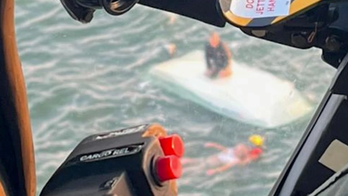 Coast Guard rescues 2 men from capsized boat in Georgia