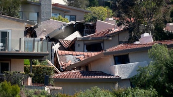 Landslide ravages homes in southern California community, evacuations continue