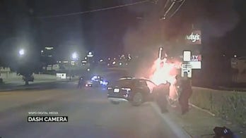 Texas police pull unconscious man from burning car in heroic rescue, video shows