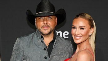 Jason Aldean says wife Brittany gets 'fired up' when defending him