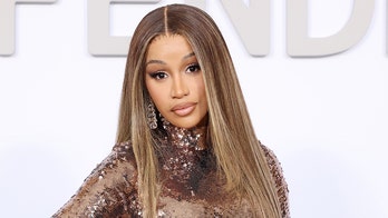 Cardi B accused of battery after flinging mic at fan during Vegas concert