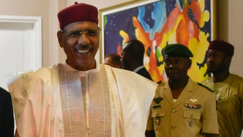 Rebelling soldiers surround Niger's presidential palace in apparent coup attempt