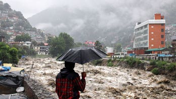 Schools in New Delhi close after heavy monsoon rains cause 15 deaths