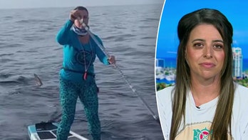 Paddleboarder in 'shock' after video catches shark following her: 'Wasn't an option to quit'