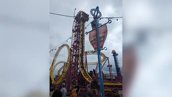 Amusement park's 'biggest' roller coaster breaks down 'right at the top' leaving riders stuck for half an hour